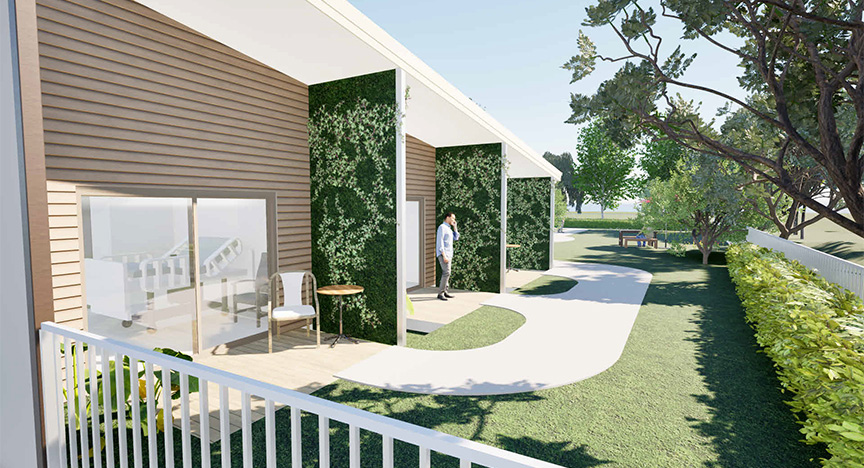 Computer-generated image of the dementia courtyard at the new Moura Multipurpose Health Service Aged Care Facility. The render shows a fenced outdoor area with three open patios. The patios have outdoor furniture and are separated by greenery-covered walls. A curved path and landscaped gardens surround the patios..