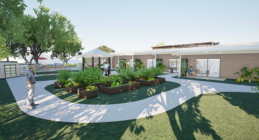 Computer-generated image of the landscaped backyard area at the new Moura Multipurpose Health Service Aged Care Facility. The render shows a fenced area wit multiple covered patio areas extending from the building, surrounded by curved paths, grass and landscaped gardens.